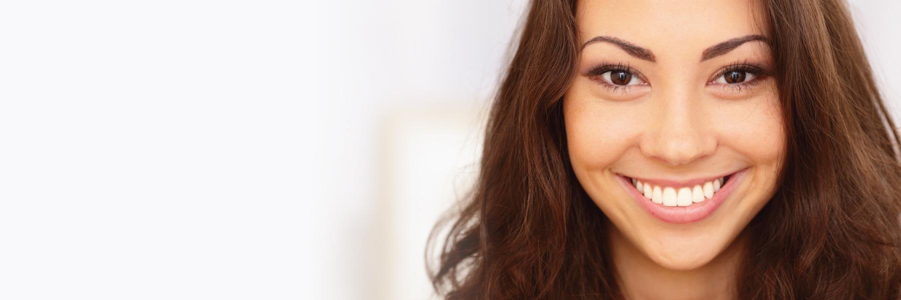 Young woman smiling l Northwest Arkansas Family Dental 