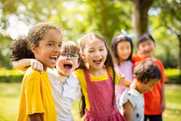 A group of Children smiling after getting dental check up in Fayetteville, AR
