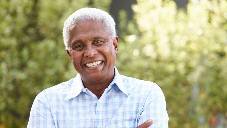 Man in Fayetteville who has white hair has a full set of teeth